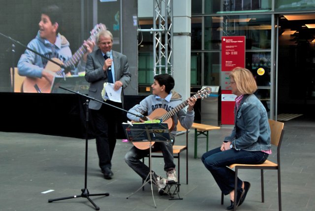 frankeerensteinheadmasterofthelocalmusicartsschoolduringoneoftheopenairconcerts.jpg